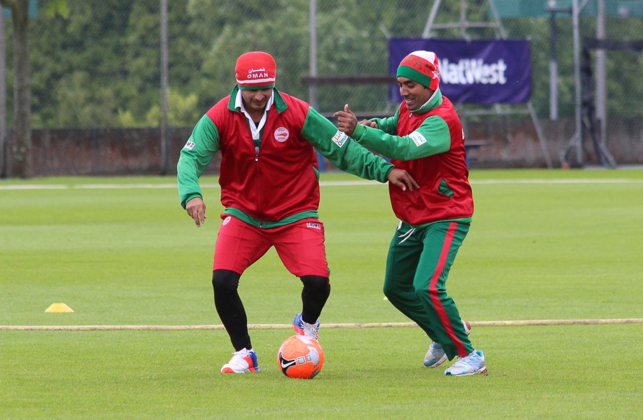 Zeeshan Maqsood (l) and Aamir Kaleem (r) fight for the ball in warm-ups, Jersey v Oman, ICC World Cricket League Division Five, St Saviour, May 21, 2016
