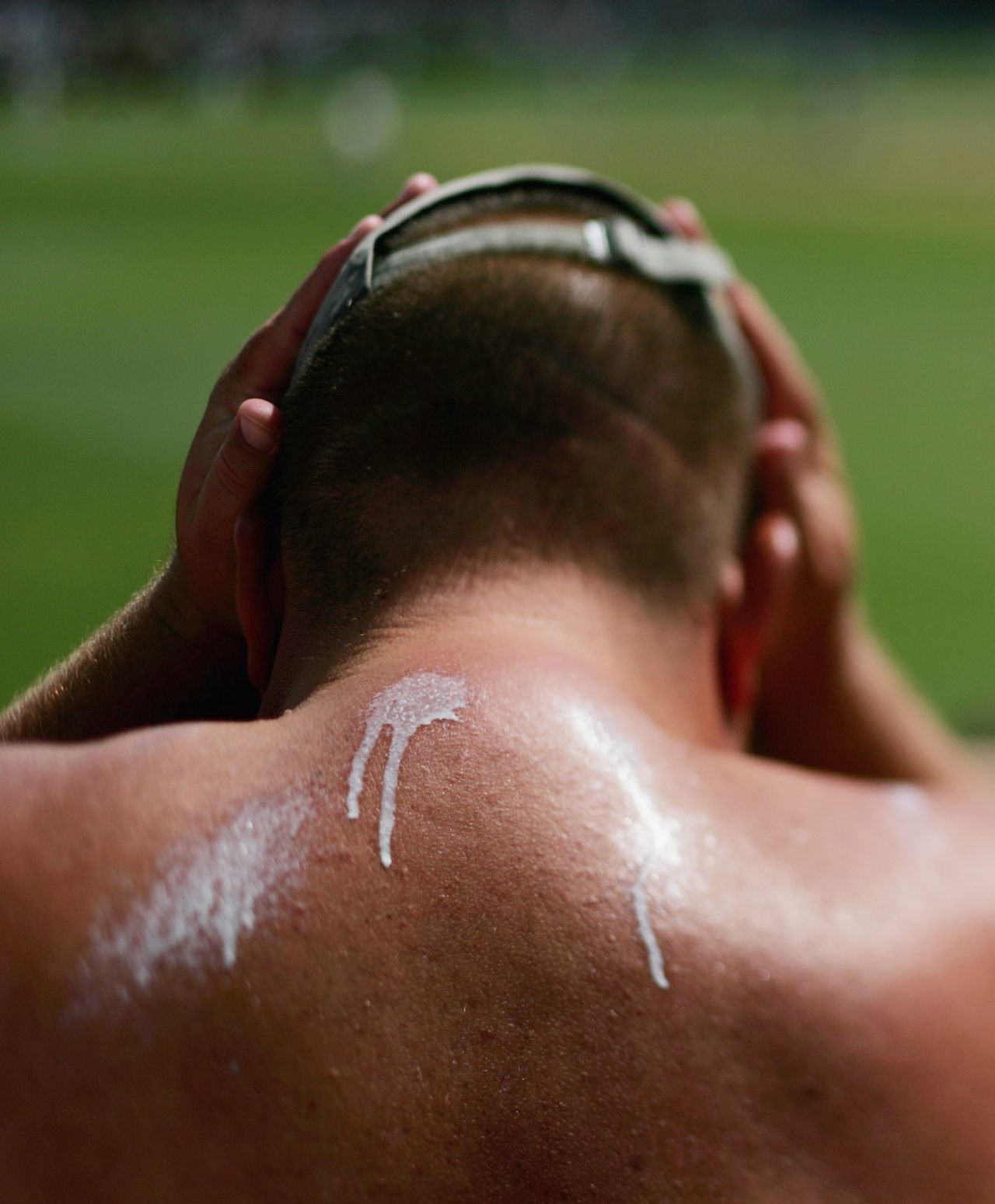 A fan sits with spots of sunscreen on his back, Australia v England, 3rd Test, Perth, 3rd day, December 16, 2006