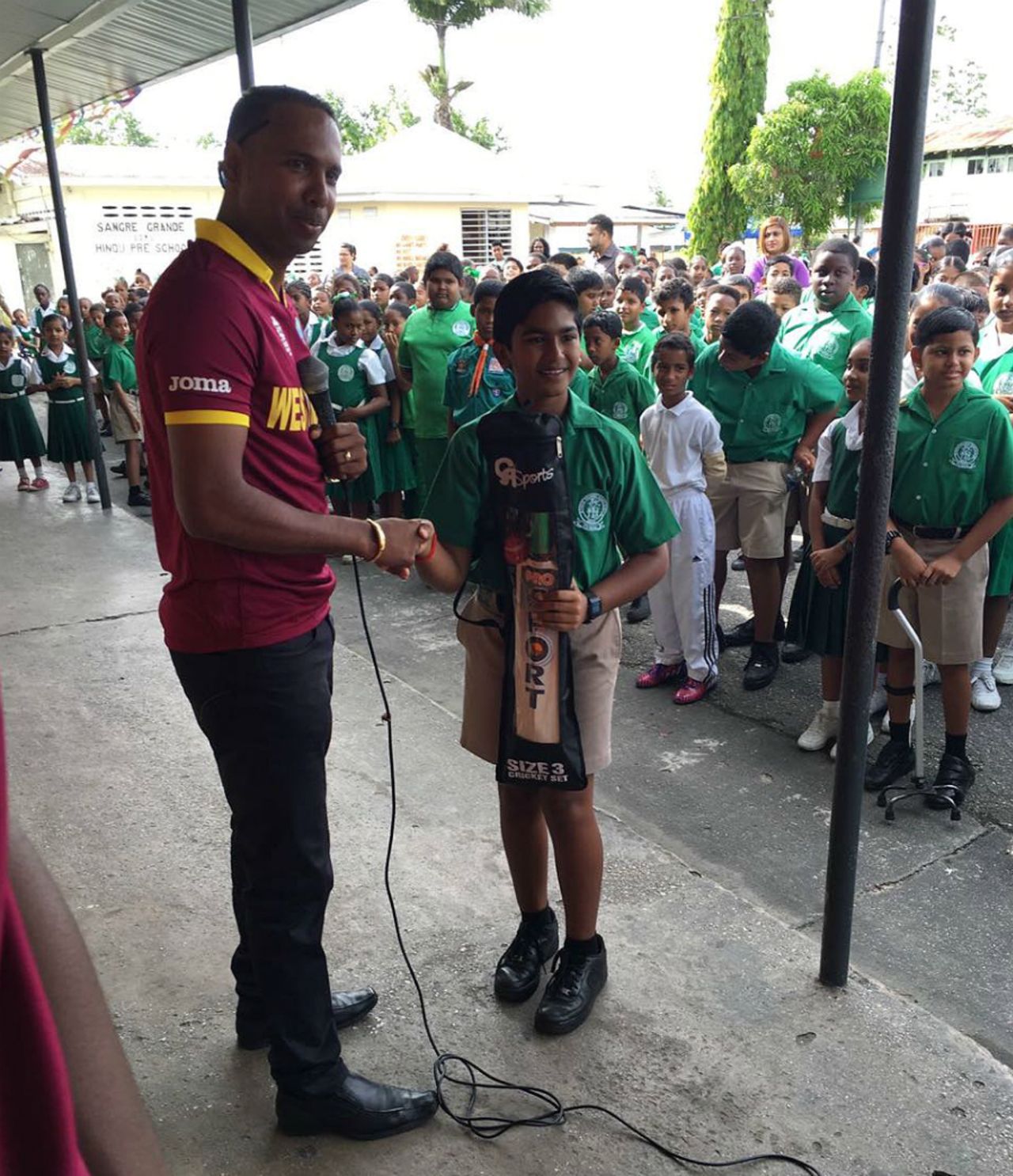 Samuel Badree interacts with schoolchildren in Trinidad as part of the Champions Schools Tour 2016, which aims to motivate kids and provide them with positive role models, May 26, 2016