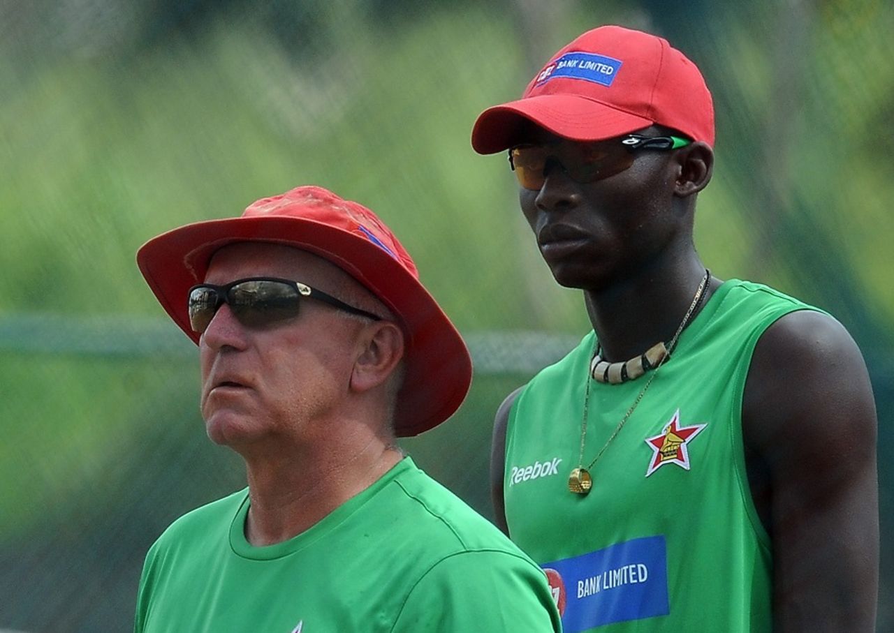 Zimbabwe coach Alan Butcher and pacer Chris Mpofu during a training session, World Cup 2011, Pallekele, March 13, 2011
