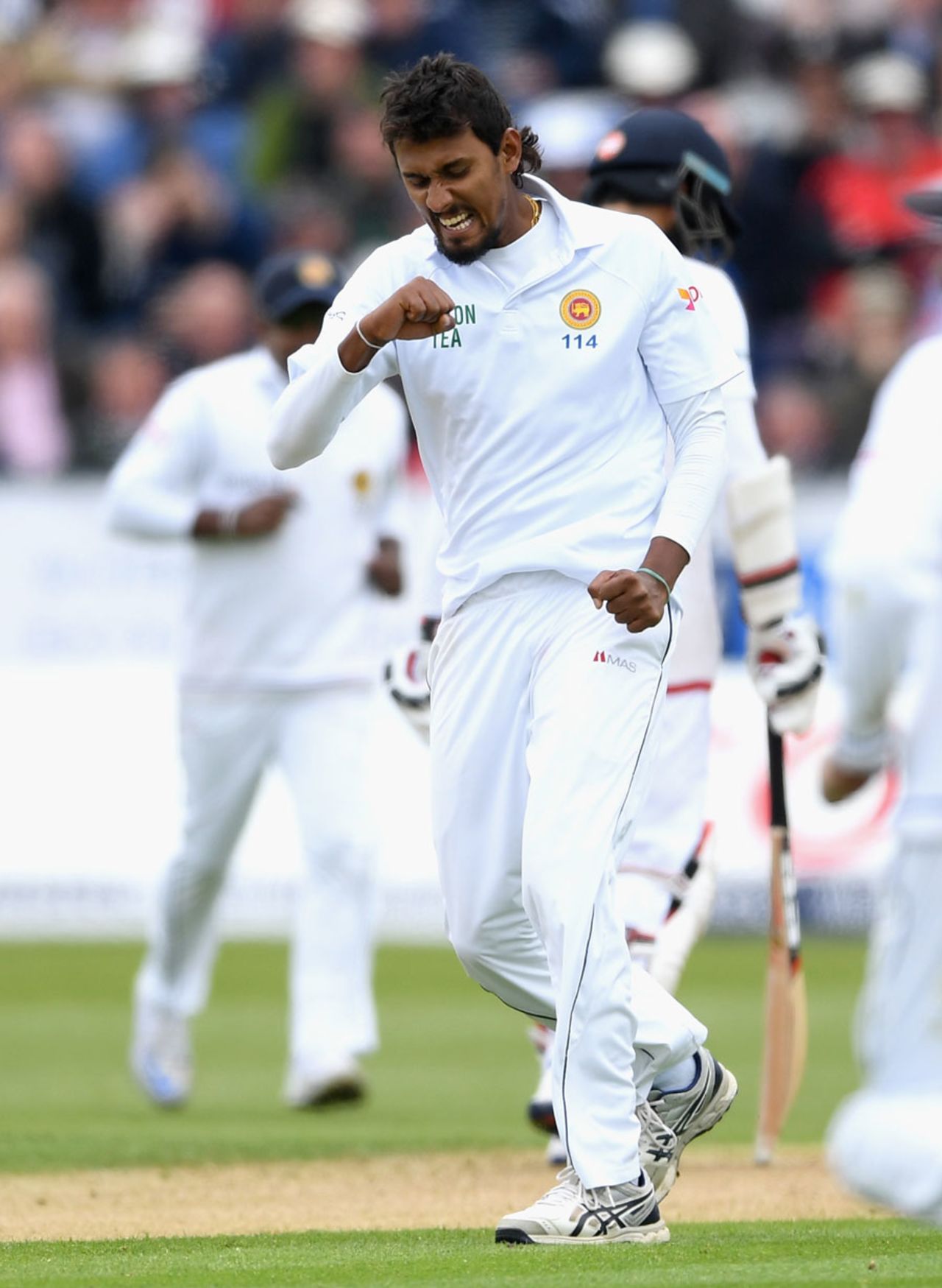 Suranga Lakmal celebrates the dismissal of Chris Woakes, England v Sri Lanka, 2nd Test, Chester-le-Street, 2nd day, May 28, 2016