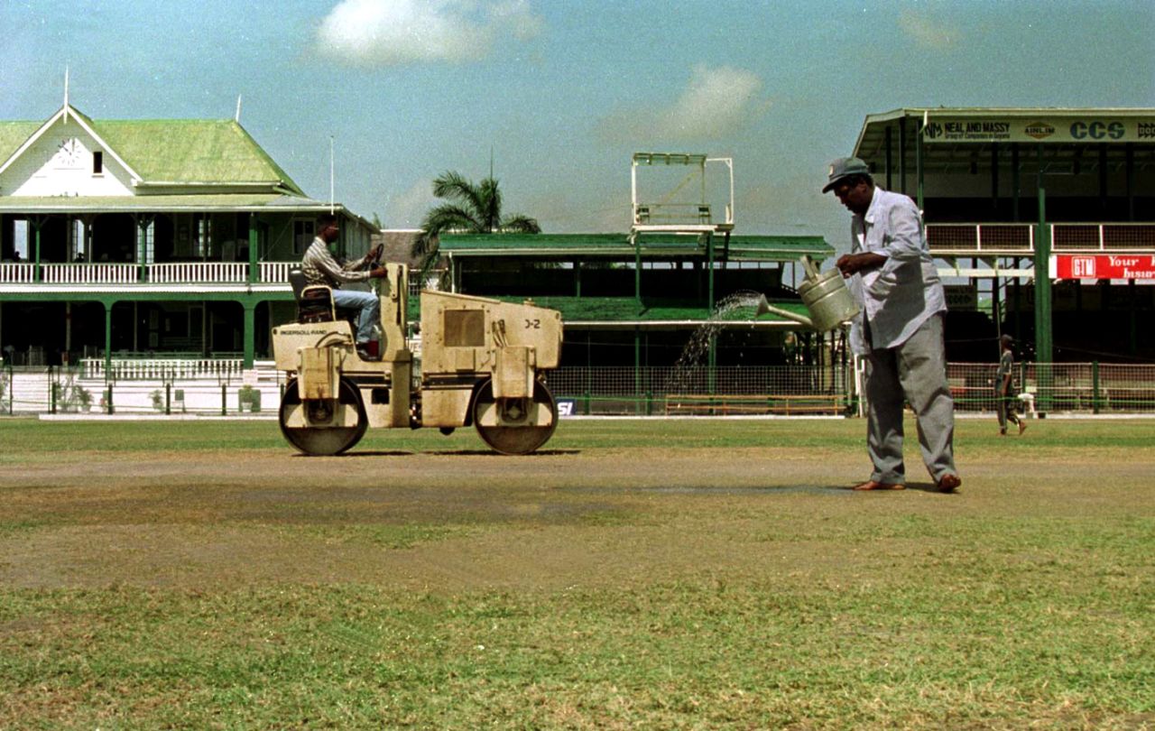 The groundsmen roll and water the pitch a day before the Test, West Indies v England, 4th Test, Georgetown, February 26, 1998