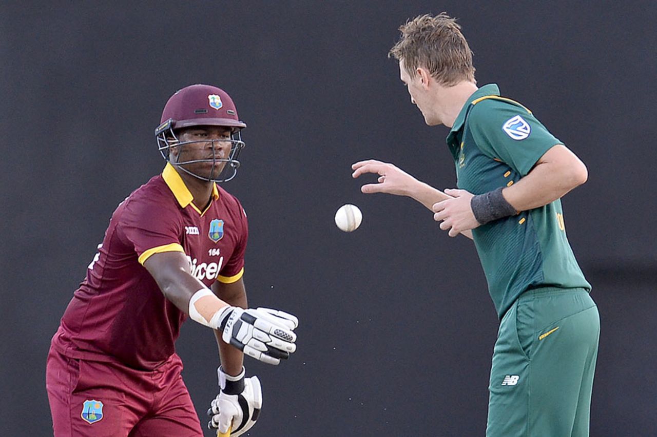 Johnson Charles hands the ball over to Chris Morris, West Indies v South Africa, ODI tri-series, 1st match, Providence, June 3, 2016