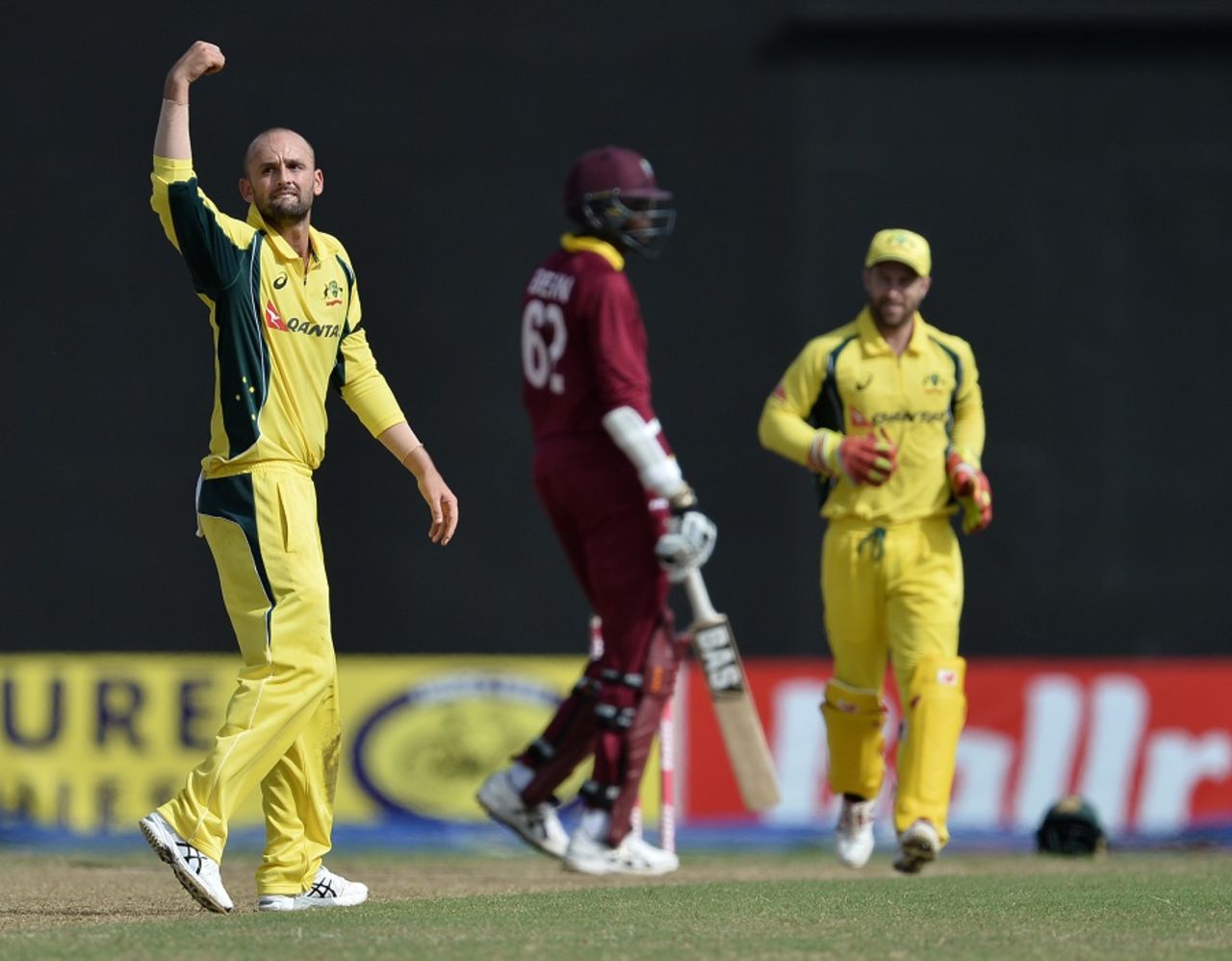 Nathan Lyon is pumped after taking a return catch, West Indies v Australia, ODI tri-series, 2nd match, Providence, June 5, 2016