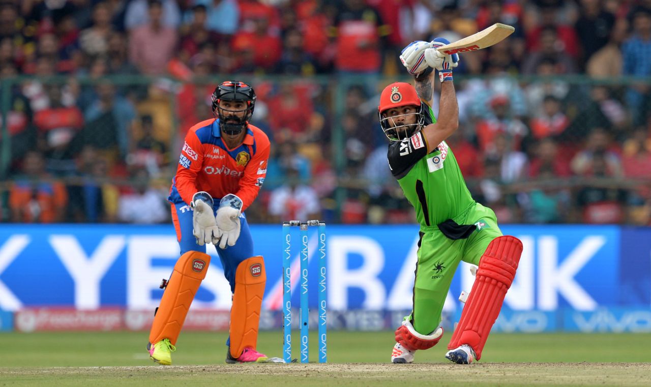 Royal Challengers Bangalore captain Virat Kohli drives, Royal Challengers Bangalore v Gujarat Lions, IPL 2016, Bangalore, May 14, 2016