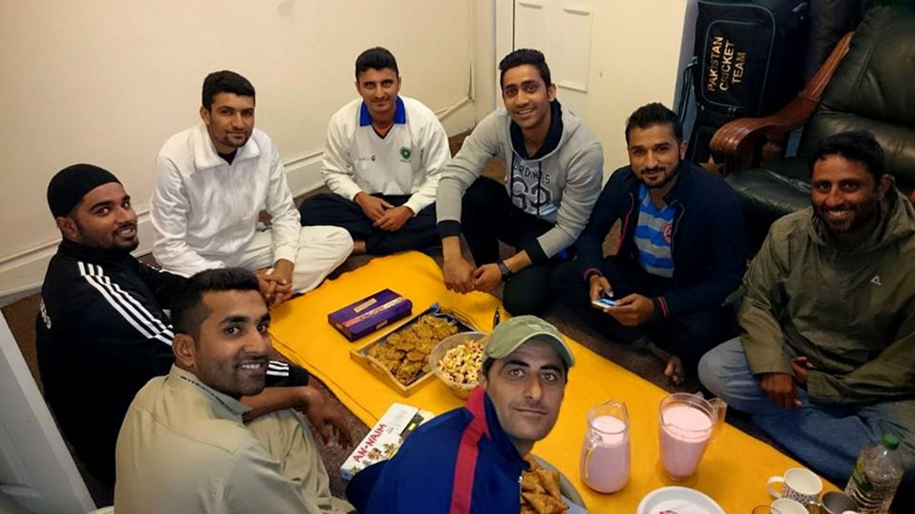 Pakistani pros in England league cricket sit down for a meal. From front (clockwise): Jalat Khan, Asif Raza, Nayyer Abbas, Sadaf Hussain, Nasir Malik, Usman Salahuddin, Bilawal Bhatti and Khalid Malik