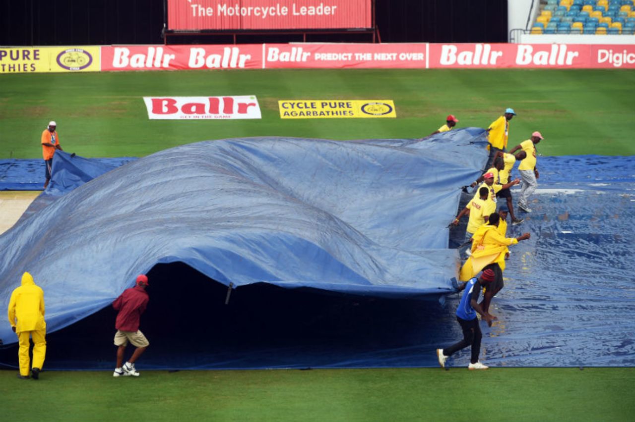 Groundstaff cover the main square of the Kensington Oval in Bridgetown, Australia v South Africa, ODI tri-series, Barbados