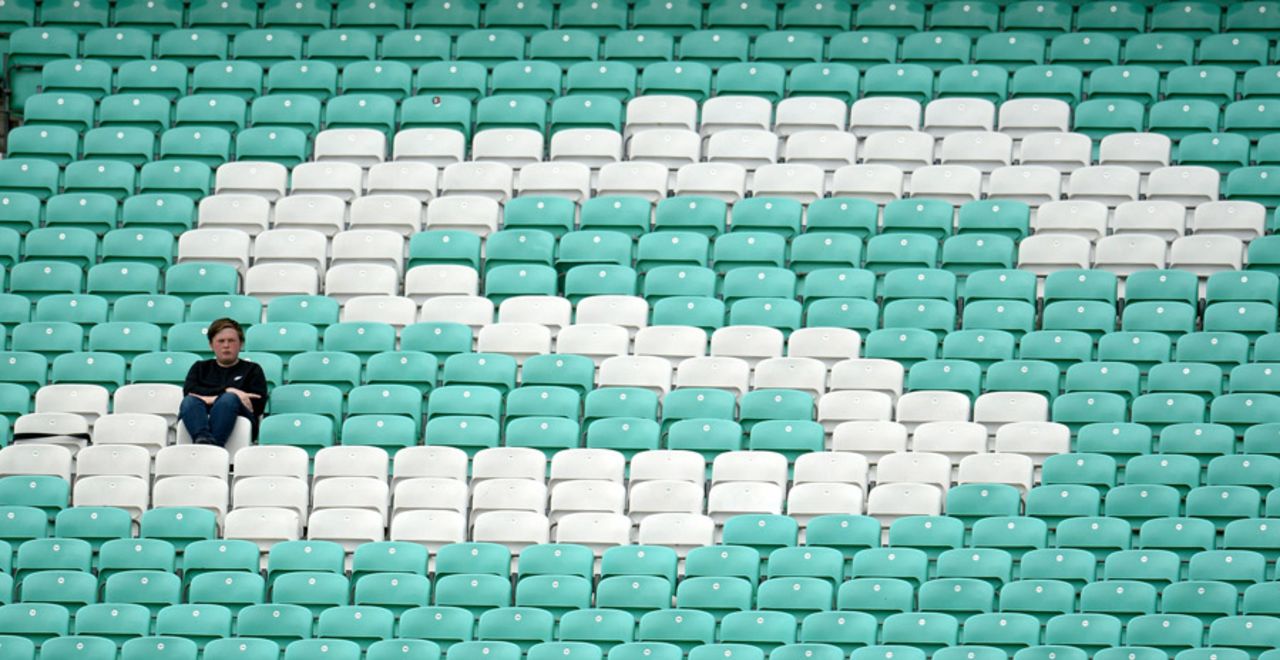 A solitary spectator watches the County Championship match between Surrey and Nottinghamshire, Kia Oval, June 19, 2016