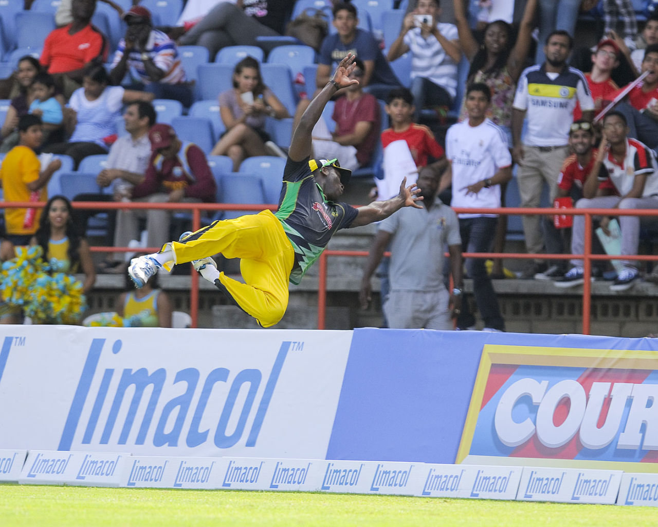 Andre Russell is airborne near the boundary, St Lucia Zouks v Jamaica Tallawahs, CPL 2014, Grenada, July 12, 2014