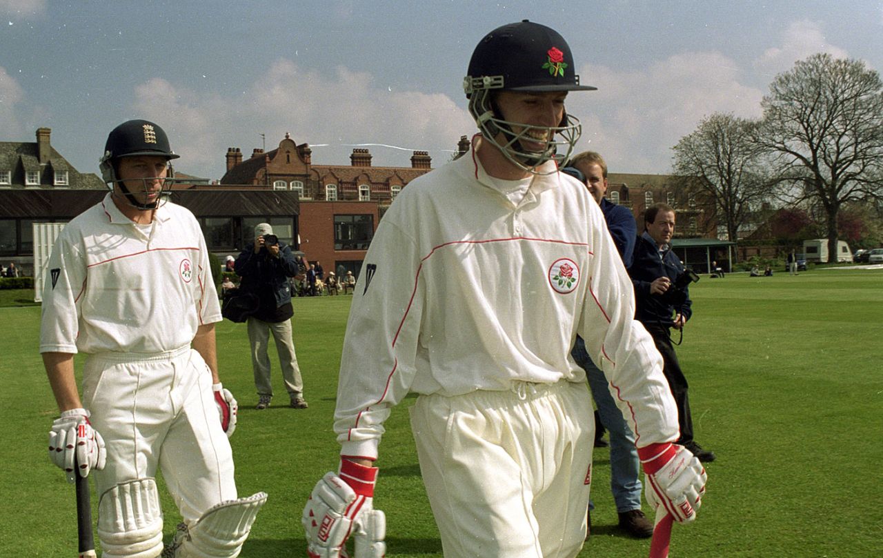 Michael Atherton and John Crawley walk out to bat for Lancashire, Fenner's, Cambridge, April 7, 2000