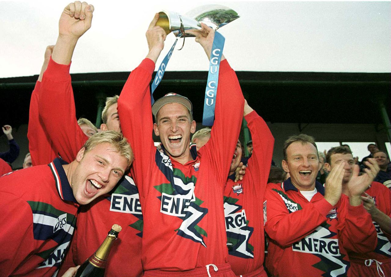 Lancashire players celebrate after winning the National League title, Lancashire v Kent, Old Trafford, September 12, 1999