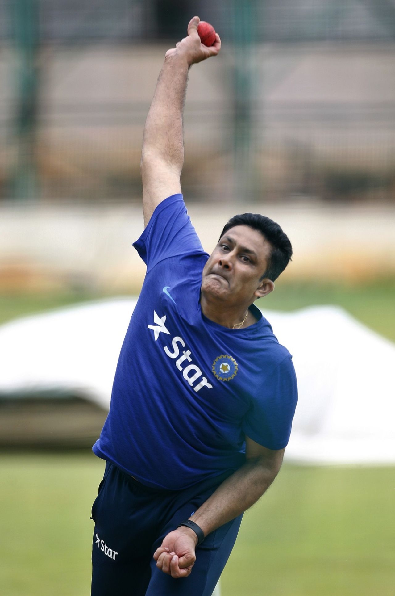 India coach Anil Kumble bowls during a training camp at the NCA, Bangalore, June 30, 2016