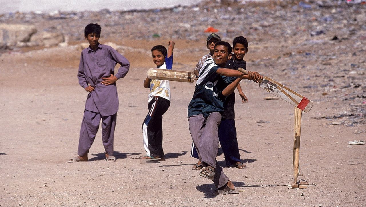 Kids play cricket in Lahore, October 26, 2000