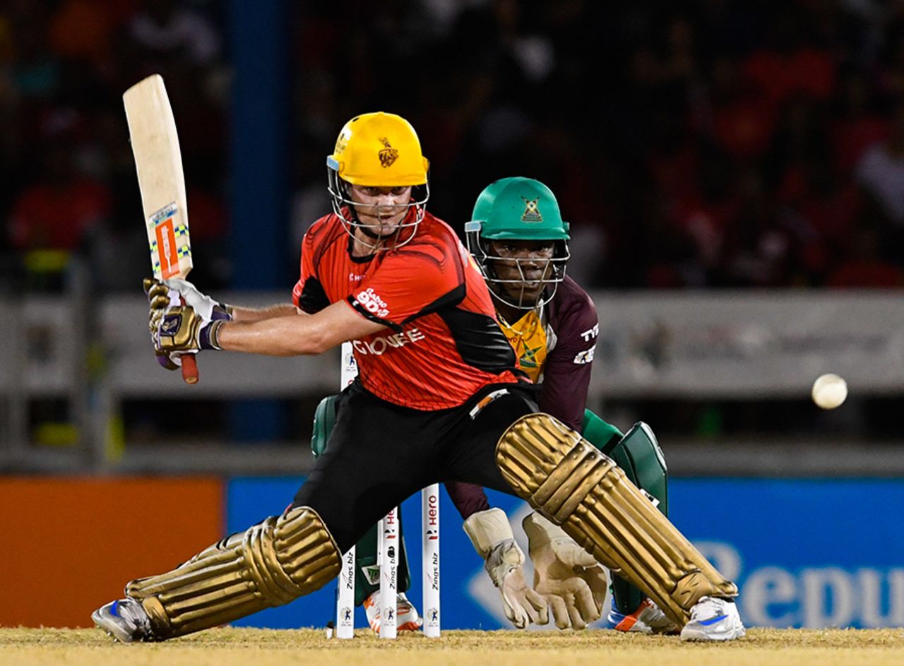 Colin Munro plays a switch-hit during his century, Trinbago Knight Riders v Guyana Amazon Warriors, CPL 2016, Port of Spain, July 2, 2016