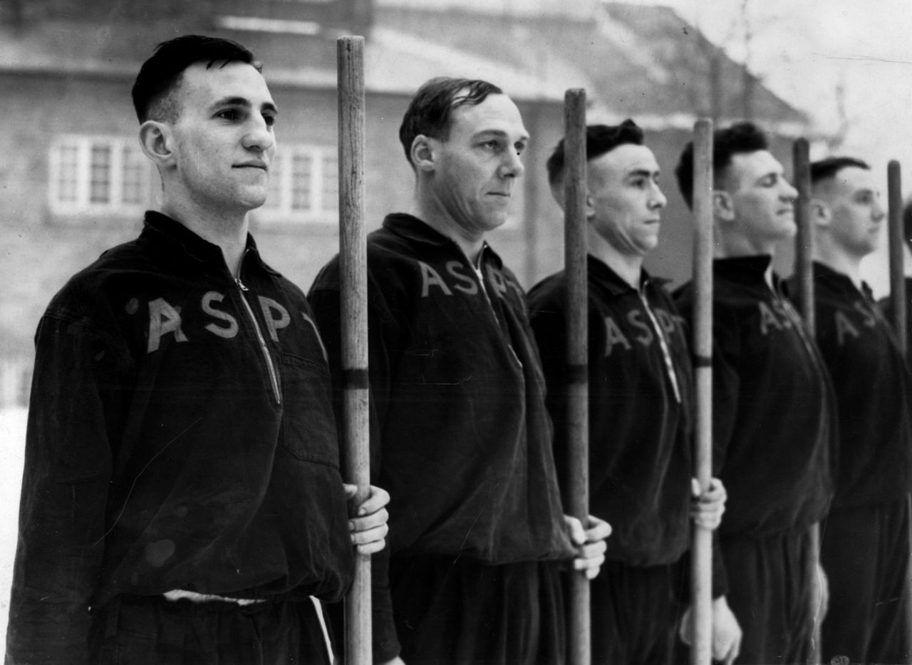Len Hutton and Stan Nichols (first and second from left) on parade at an Army School of Physical Training during World War II, April 1940