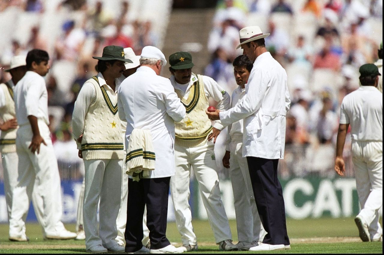 The umpires discuss the condition of the ball with the Pakistan players, England v Pakistan, third Test, day four, July 6, 1992