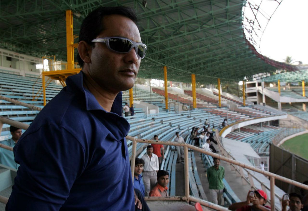 Mohammad Azharuddin watches a domestic fixture at the Wankhede Stadium in Mumbai, December 12, 2005