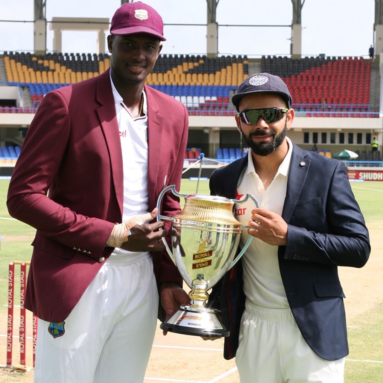 Jason Holder and Virat Kohli with the series trophy, West Indies v India, 1st Test, Antigua, 1st day, July 21, 2016