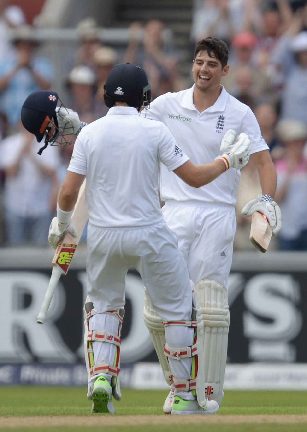 Alastair Cook gets a hug from Joe Root after notching a century, England v Pakistan, 2nd Investec Test, Old Trafford, 1st day, July 22, 2016
