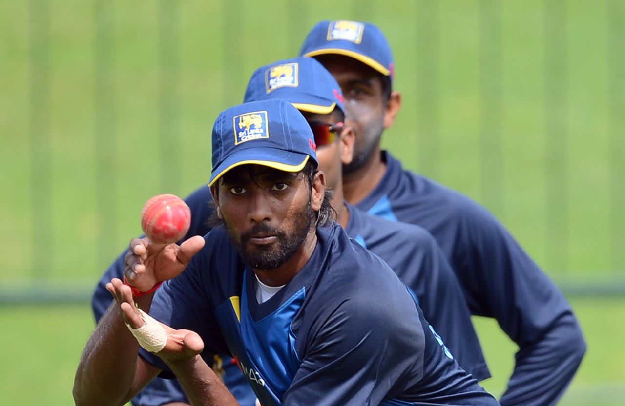 Nuwan Pradeep takes a catch during Sri Lanka's training session, Pallekele, July 23, 2016