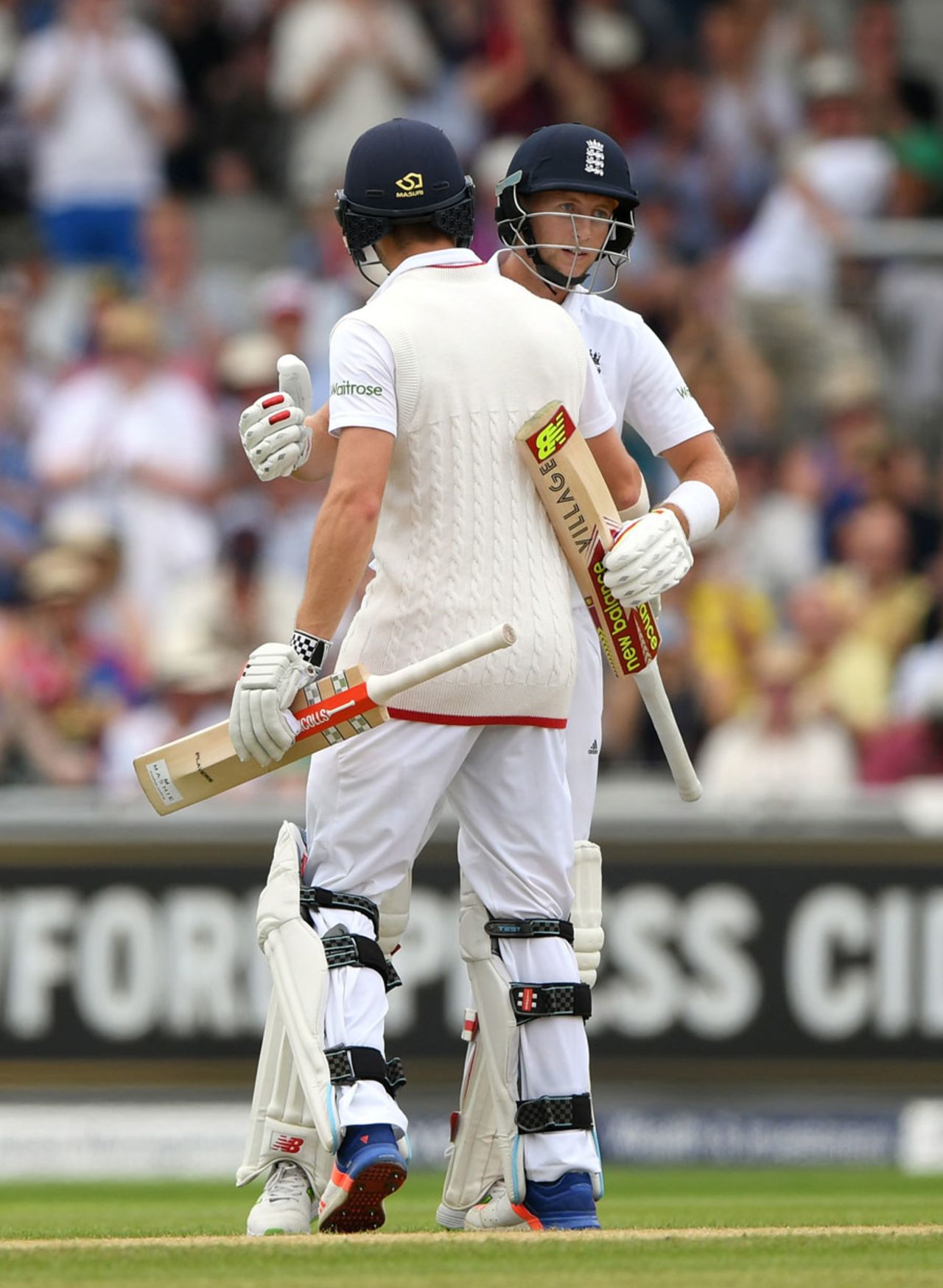 Chris Woakes congratulates Joe Root on reaching 150 , England v Pakistan, 2nd Investec Test, Old Trafford, 2nd day, July 23, 2016