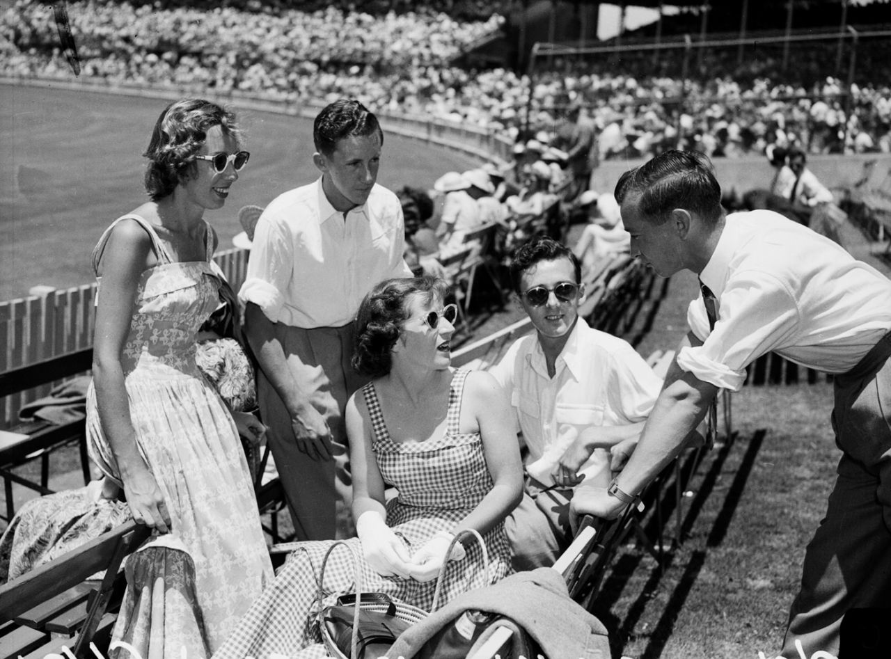Spectators chat while waiting for the start of the match, Australia v England, 3rd Test, Sydney, 1st day, January 5, 1951
