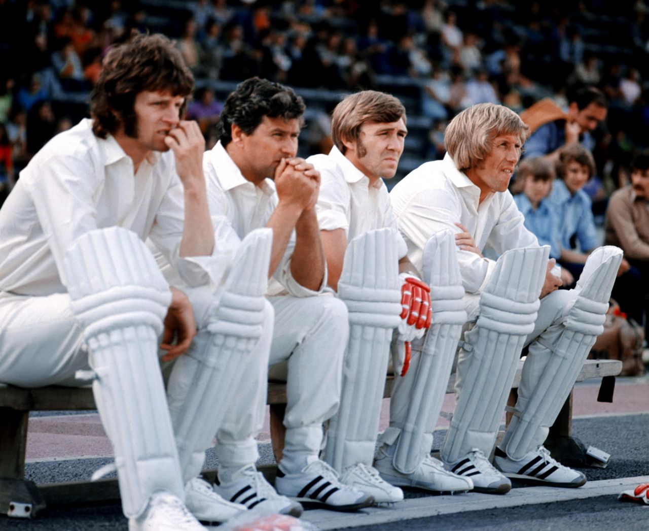 Footballer Mick Channon, sailor Chay Blyth, boxer John Stracey and footballer Colin Bell wait for their turn in the Superstars cricket contest in Crystal Palace, July 23, 1974