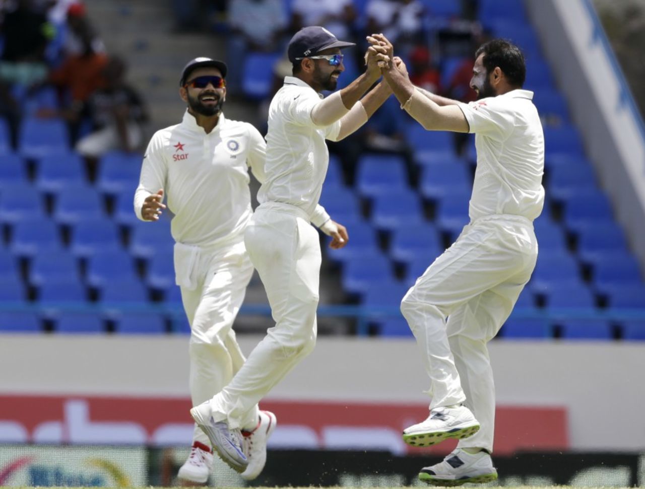 Mohammed Shami celebrates the wicket of Marlon Samuels, West Indies v India, 1st Test, Antigua, 3rd day, July 23, 2016
