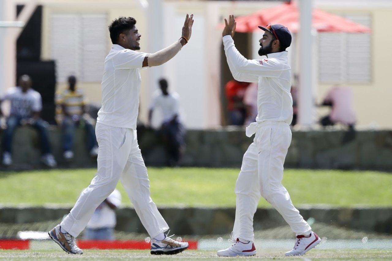 Umesh Yadav is congratulated by Virat Kohli, West Indies v India, 1st Test, Antigua, 3rd day, July 23, 2016