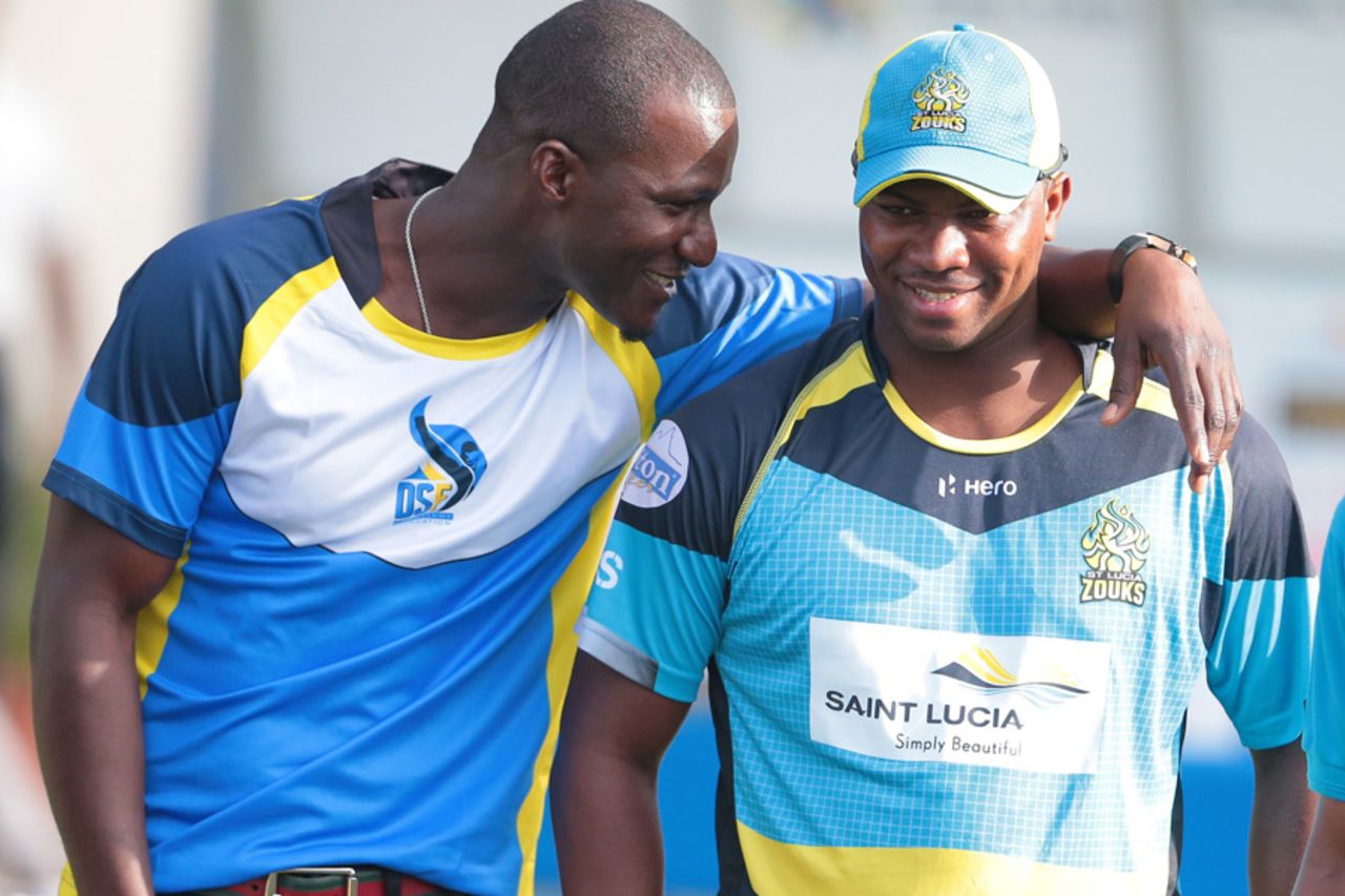 Darren Sammy and Johnson Charles share a laugh at a ceremony in which the Beausejour Stadium was renamed after Darren Sammy and a stand in it after Johnson Charles, St Lucia, July 21, 2016