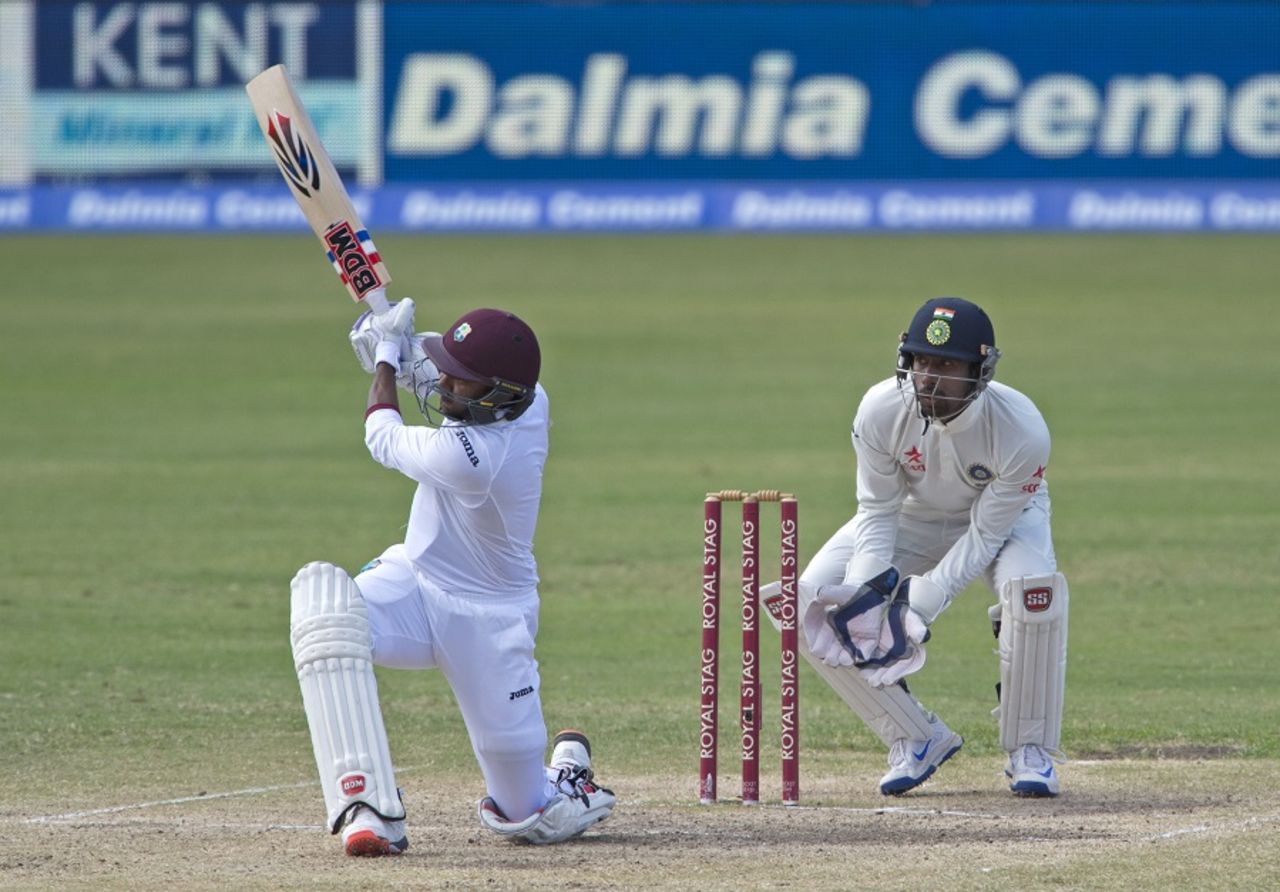 Devendra Bishoo unleashes a sweep, West Indies v India, 1st Test, Antigua, 4th day, July 24, 2016