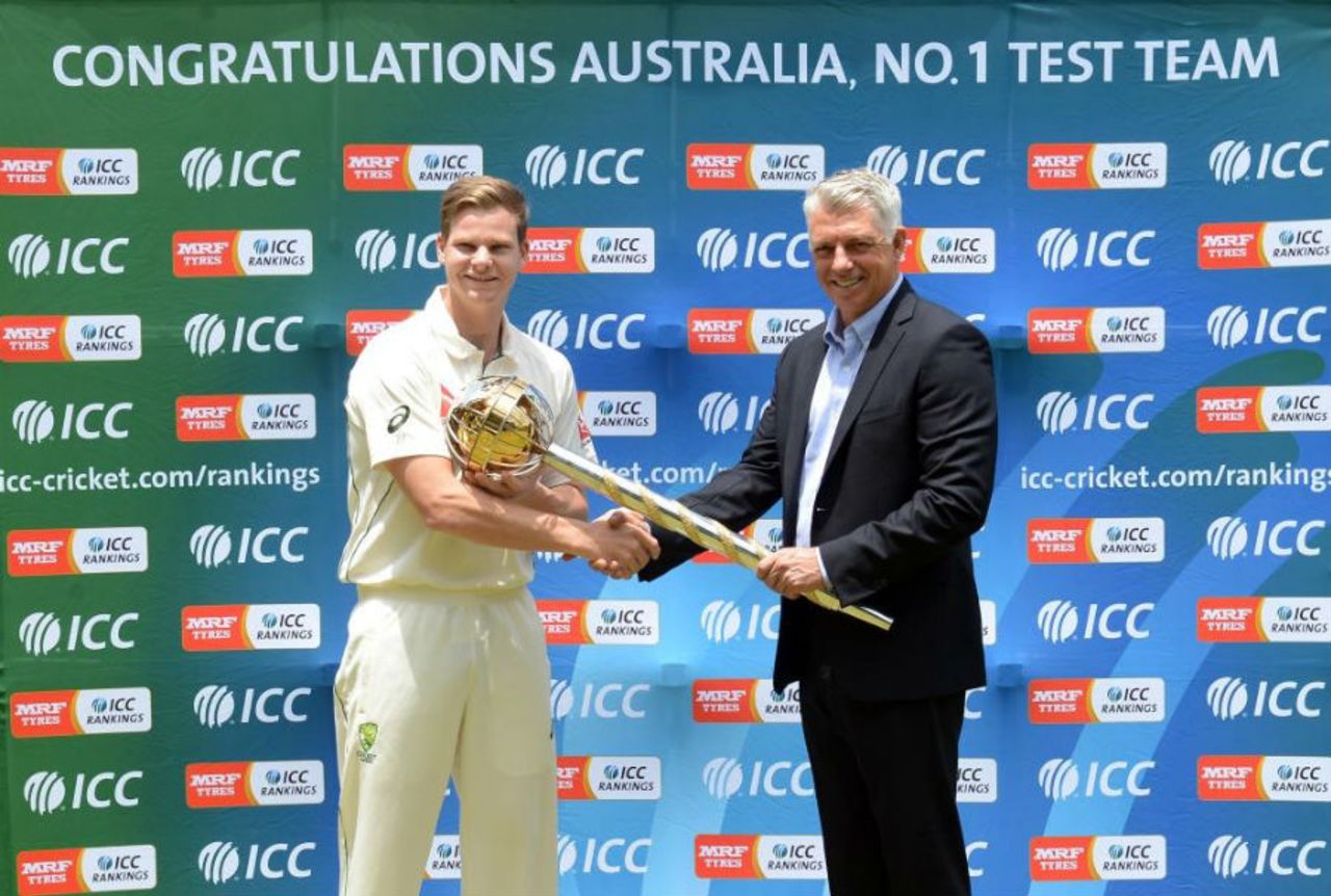 ICC CEO David Richardson presents Steven Smith with the Test mace in Pallekele, July 25, 2016