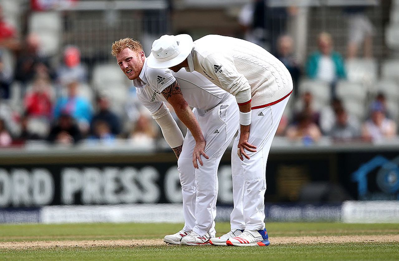 Ben Stokes is consoled by Stuart Broad after pulling up in his followthrough, England v Pakistan, 2nd Investec Test, Old Trafford, 4th day, July 25, 2016