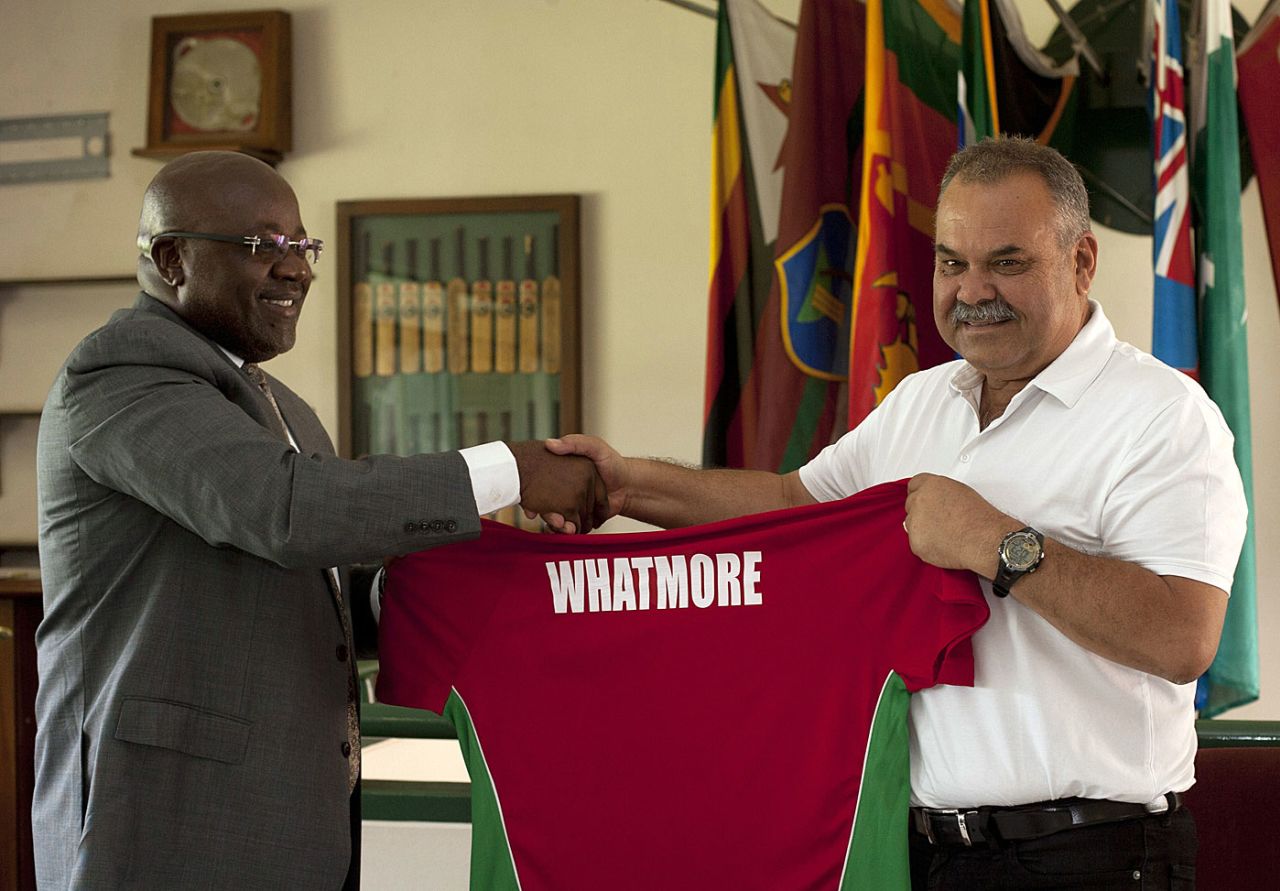 Dav Whatmore receives his personalised jersey from Zimbabwe Cricket chairman Wilson Manase, Harare, December 30, 2014