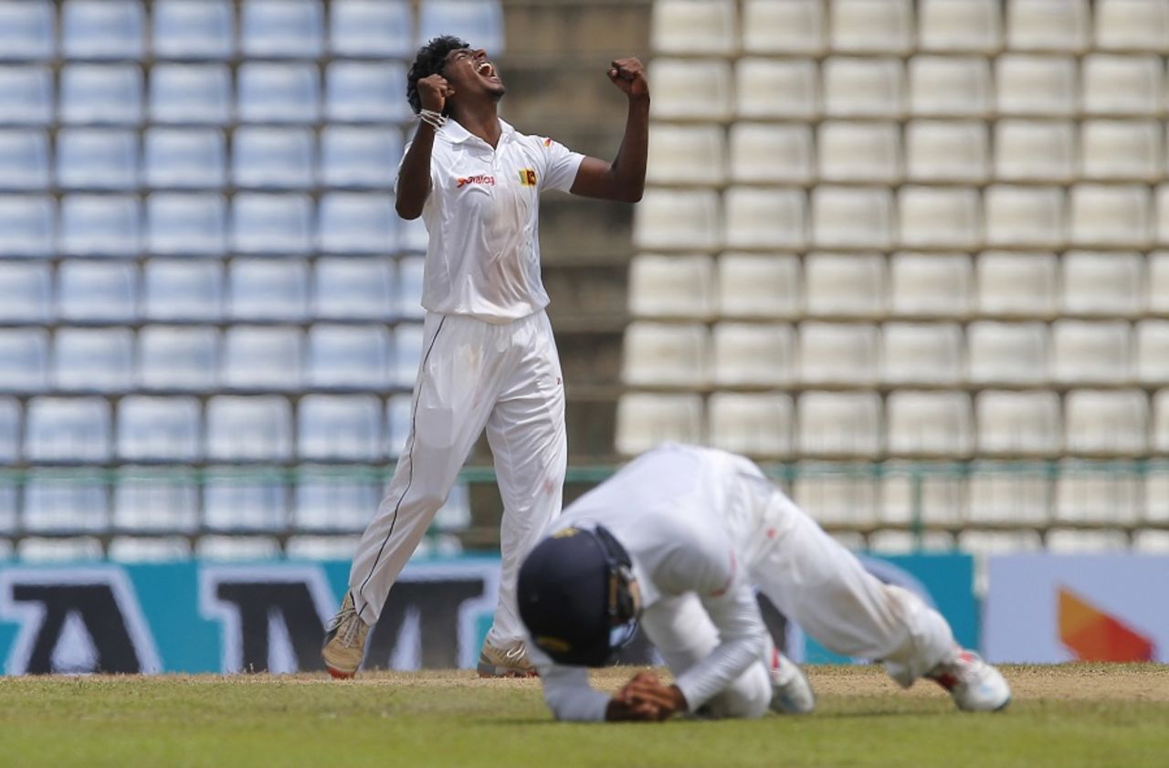Lakshan Sandakan celebrates as Kusal Mendis takes a catch to dismiss Steve O'Keefe, Sri Lanka v Australia, 1st Test, Pallekele, 2nd day, July 27, 2016