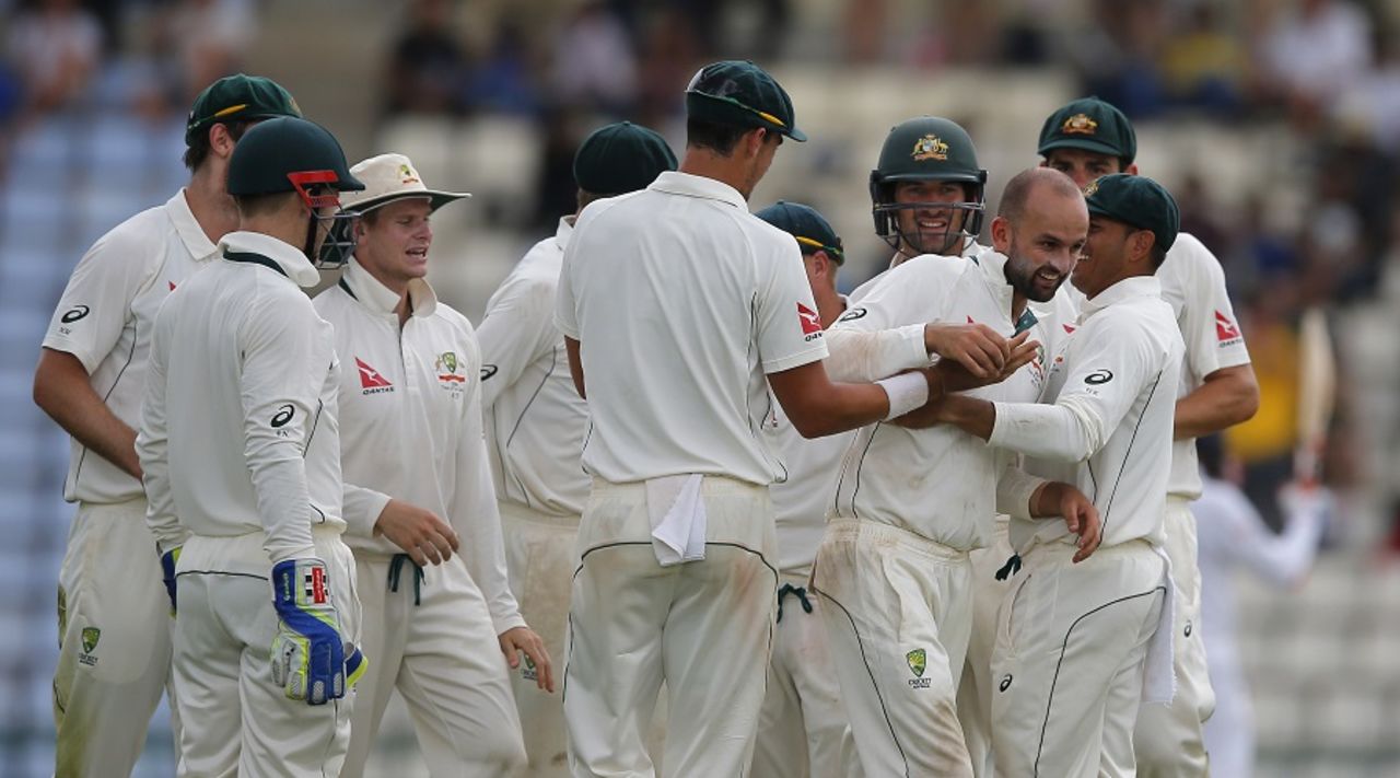 Nathan Lyon is congratulated by team-mates after picking up his 200th Test wicket, Sri Lanka v Australia, 1st Test, Pallekele, 3rd day, July 28, 2016