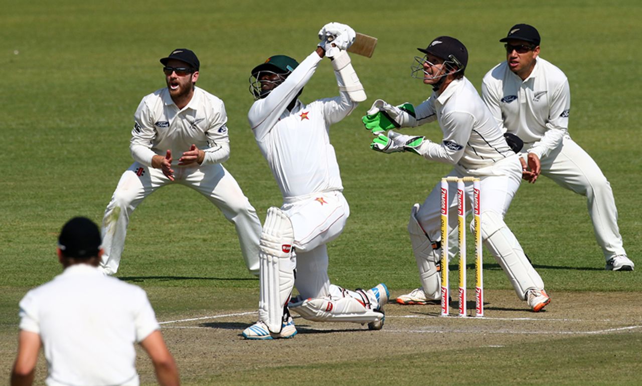 Donald Tiripano hits out over the top, Zimbabwe v New Zealand, 1st Test, Bulawayo, 1st day, July 28, 2016