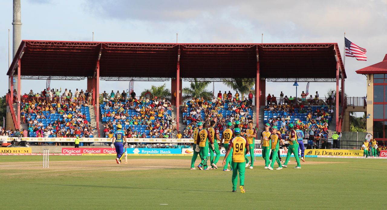 Rayad Emrit and his Amazon Warriors team-mates celebrate the wicket of Kyle Hope, Barbados Tridents v Guyana Amazon Warriors, CPL 2016, Lauderhill, July 28, 2016