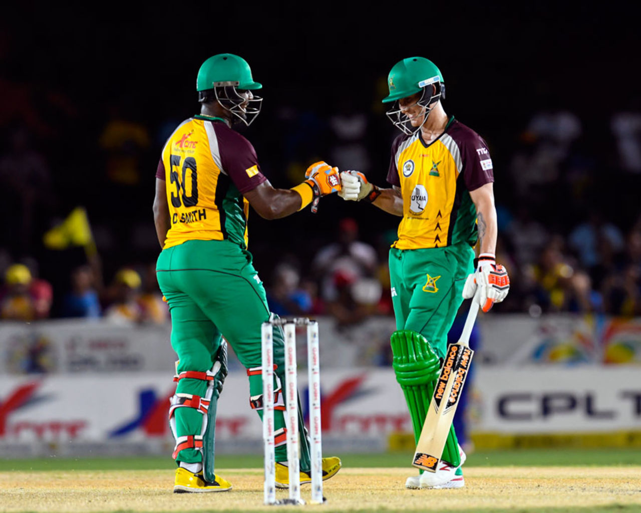 Dwayne Smith and Nic Maddinson have a chat during their stand of 92, Barbados Tridents v Guyana Amazon Warriors, CPL 2016, Lauderhill, July 28, 2016