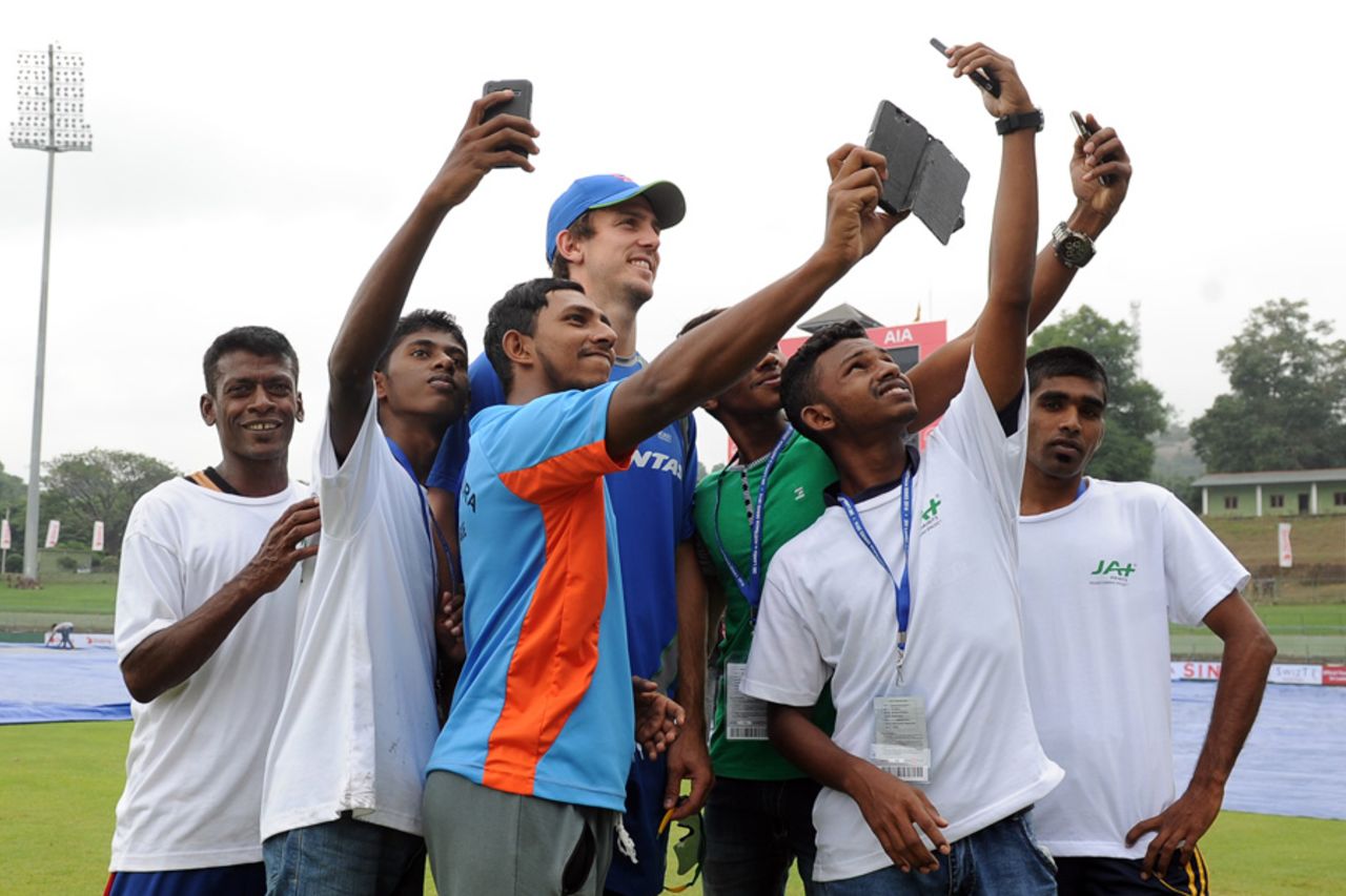 Ground staff at Pallekele take selfies with Mitchell Marsh during a rain delay, Sri Lanka v Australia, 1st Test, Pallekele, 4th day, July 29, 2016