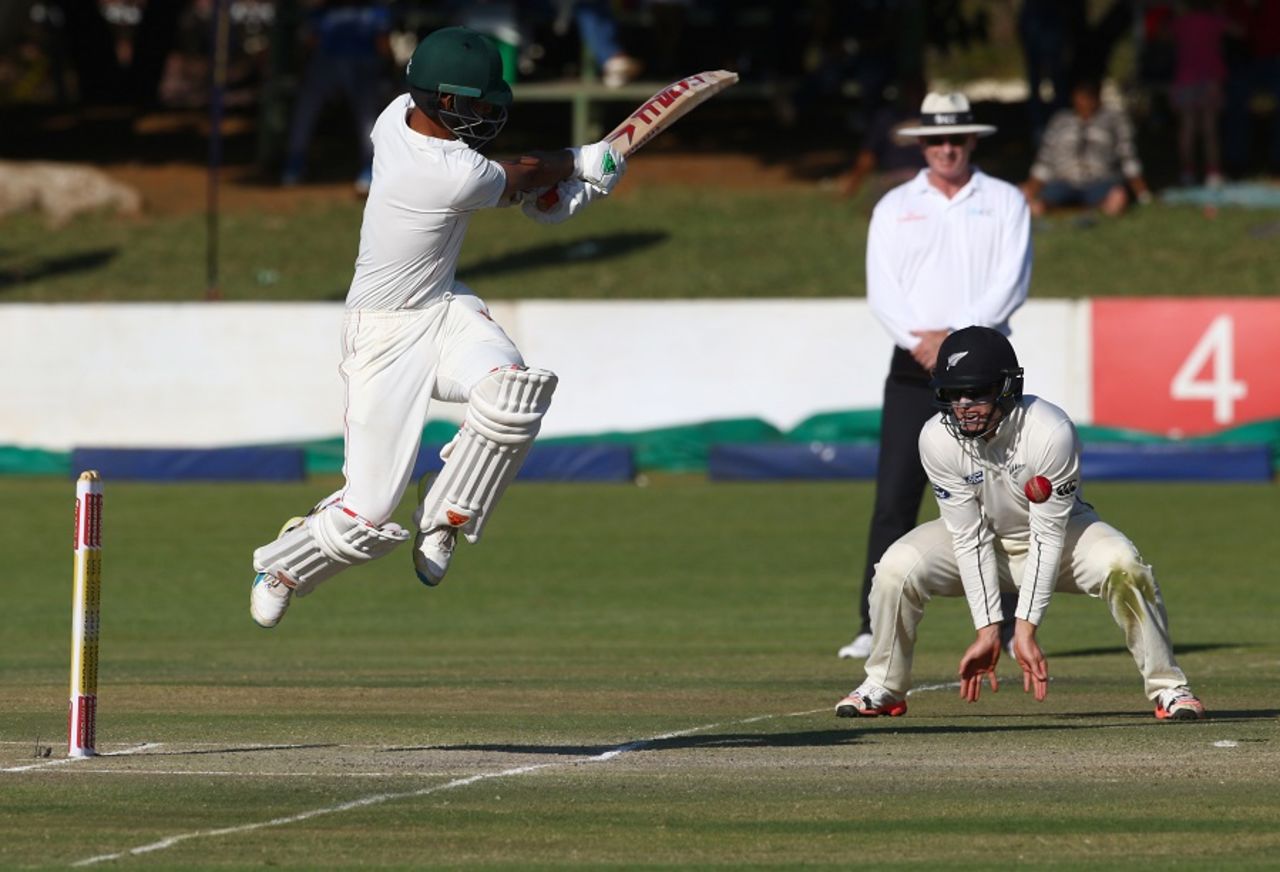 Sikandar Raza hits one awkwardly close to Henry Nicholls at short leg, Zimbabwe v New Zealand, 1st Test, Bulawayo, 3rd day, July 30, 2016