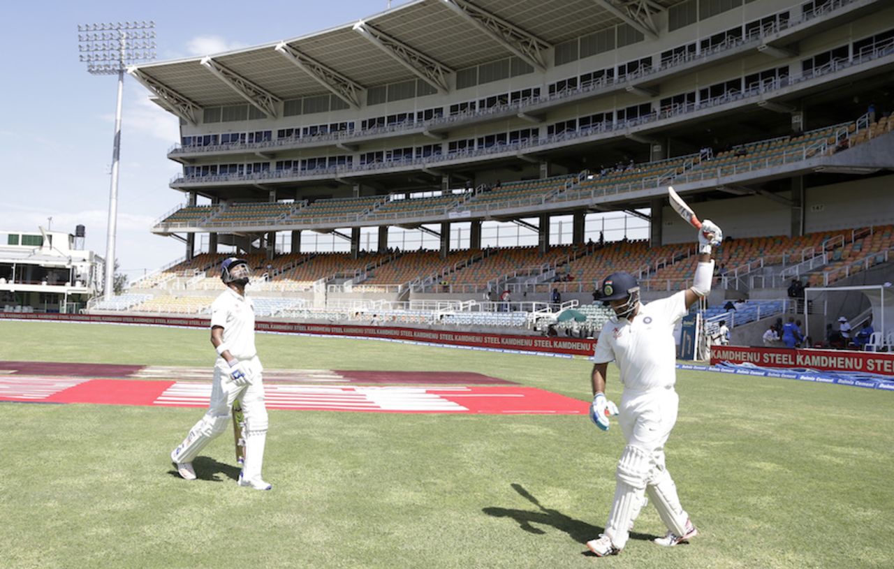 KL Rahul and Cheteshwar Pujara walk out to bat on the second morning, West Indies v India, 2nd Test, Kingston, 2nd day, July 31, 2016