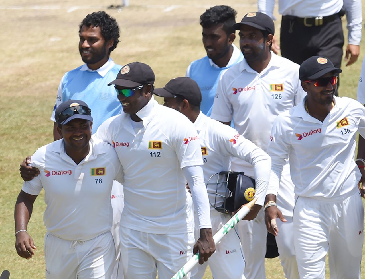 Rangana Herath and Angelo Mathews are all smiles as they walk off the field, Sri Lanka v Australia, 2nd Test, Galle, 3rd day, August 6, 2016