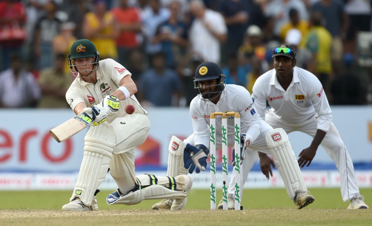 Steven Smith gets down for a paddle sweep, Sri Lanka v Australia, 3rd Test, SSC, 2nd day, August 14, 2016