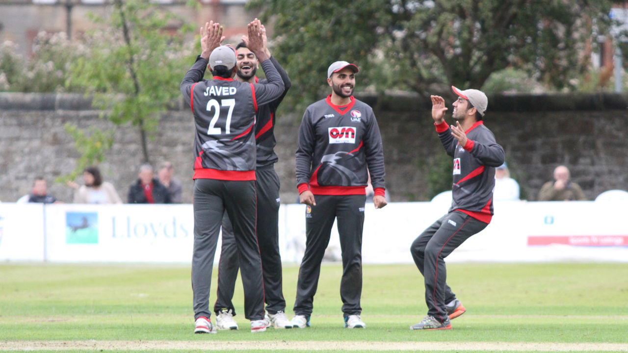 Amjad Javed high fives Ahmed Raza after the wicket of Craig Wallace, Scotland v UAE, ICC WCL Championship, Edinburgh, August 14, 2016