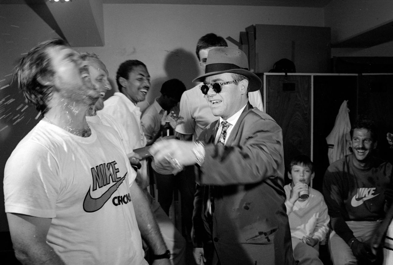 Elton John celebrates England's Ashes victory with Mike Gatting and the rest of the players in the dressing room, Australia v England, 4th Test, Melbourne, 3rd day, December 28, 1986