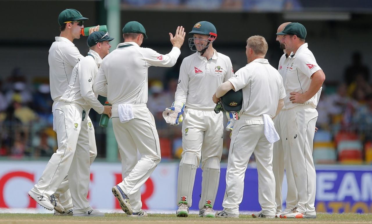 Peter Nevill is mobbed by his team-mates,  Sri Lanka v Australia, 3rd Test, SSC, 4th day, August 16, 2016