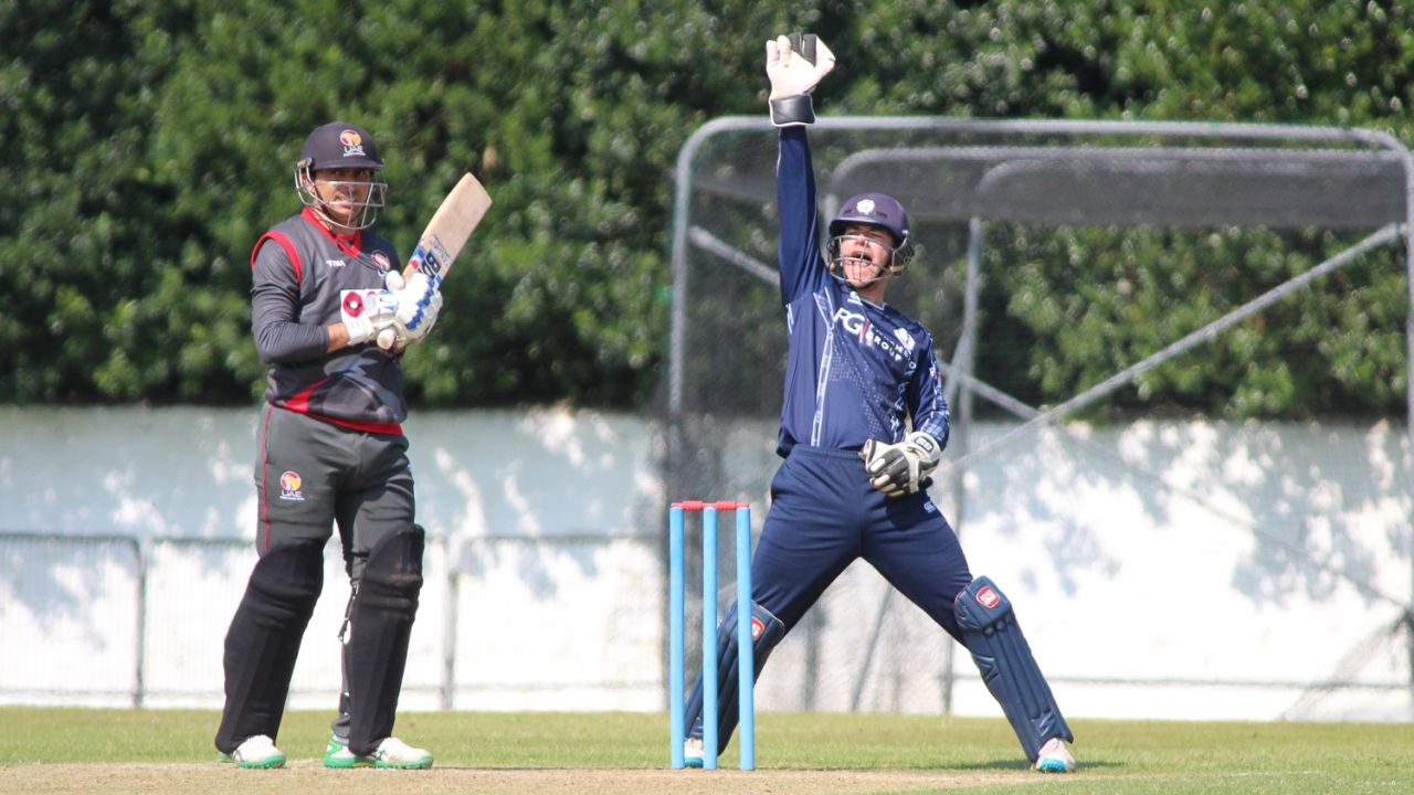 Matthew Cross belts out a successful lbw appeal for the wicket of Saqlain Haider, Scotland v UAE, ICC WCL Championship, Edinburgh, August 16, 2016
