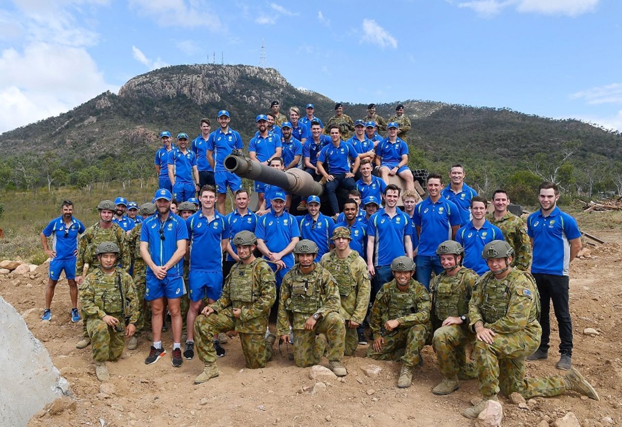 The Australia A, National Performance Squad players and soldiers from the Australian Army pose with a M1A1 Abrams tank, Lavarack Barracks, Townsville, August 18, 2016