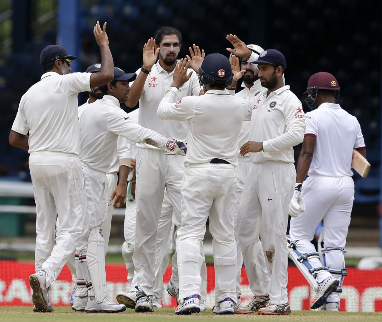Ishant Sharma celebrates with team-mates after dismissing Leon Johnson early, West Indies v India, 4th Test, Port of Spain, 1st day, August 18, 2016